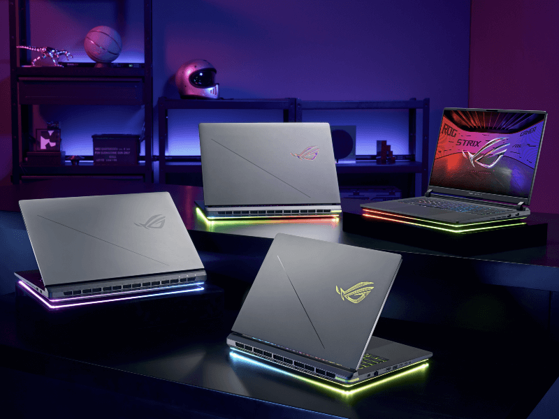 ROG laptops arranged in a tiered gaming area